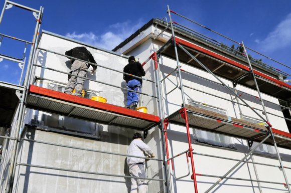 Pose et application d'enduit de façade pour imperméabiliser sa façade à Créteil